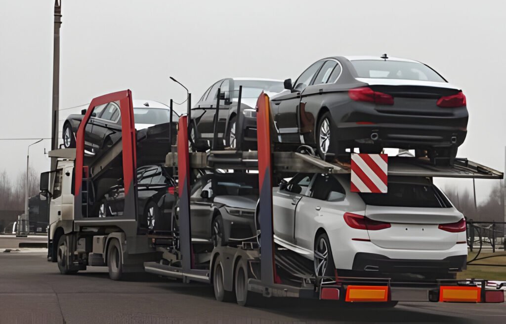 A car carrier truck loaded with cars: Breamway auto transport