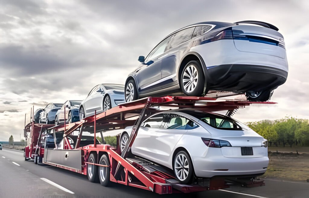 car hauler on highway carrying cars